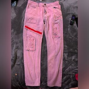 Ribbed jeans with “Lover” sign stitched on